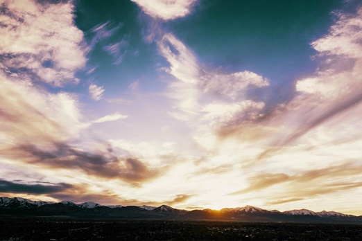 sun rising over the mountains