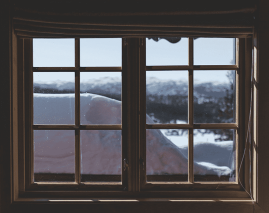 window with snow outside during winter